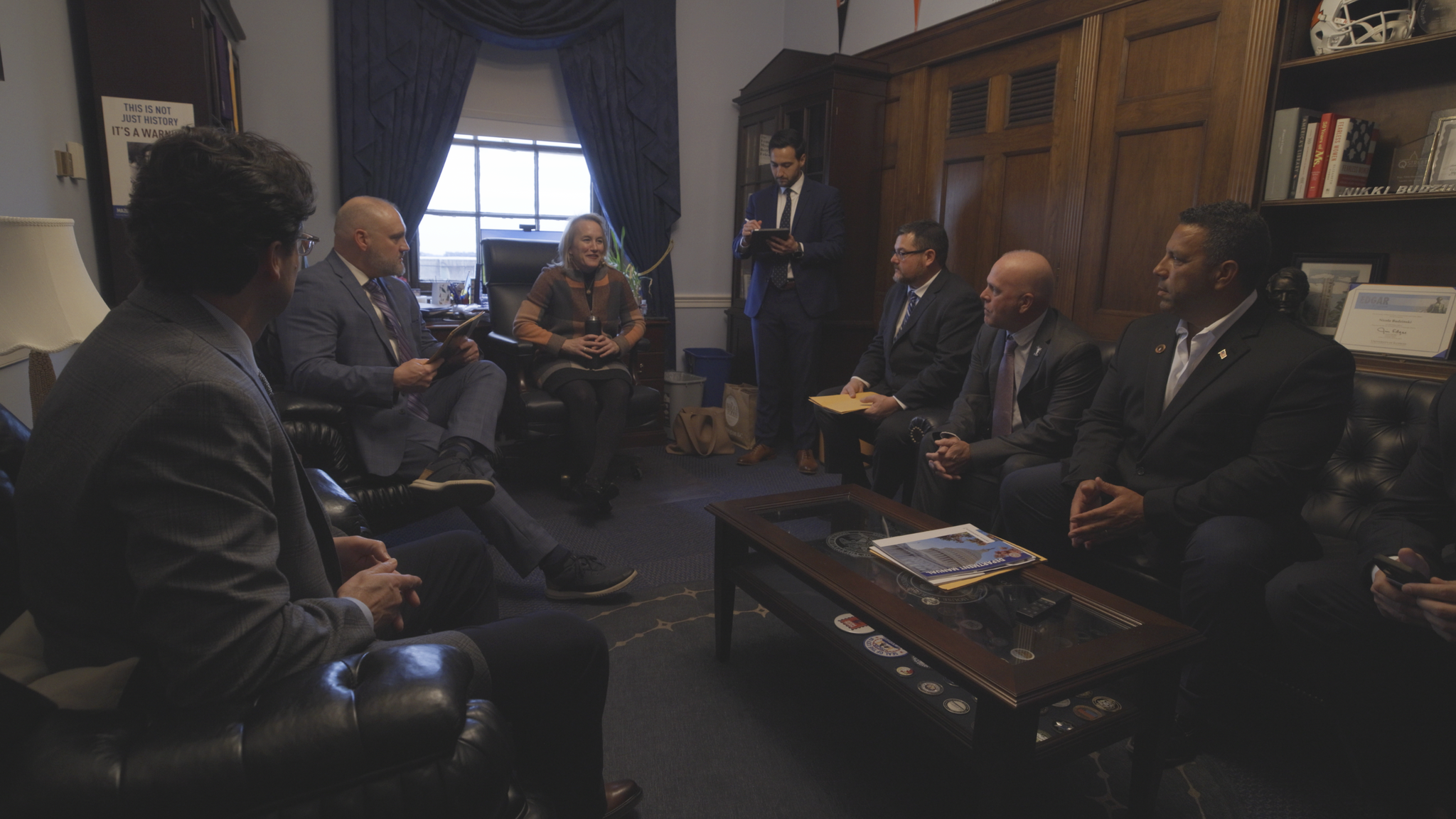 An IBEW delegation meets on Capitol Hill with Illinois Rep. Nikki Budzinski, center, on Nov. 18.
